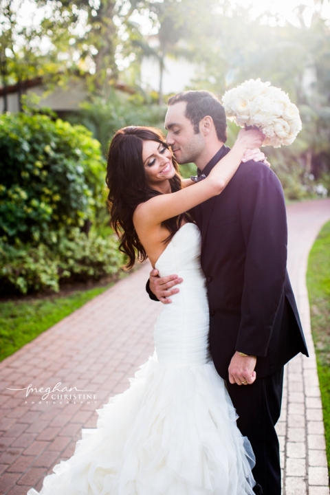 Four Seasons Biltmore Wedding Husband Holding and Kissing Wife Photo
